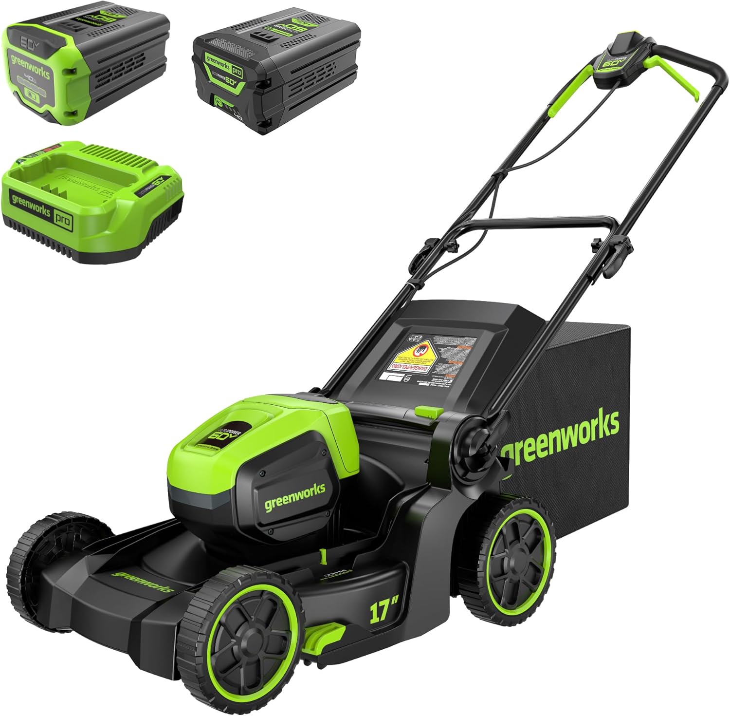 Electric lawn mower on green grass