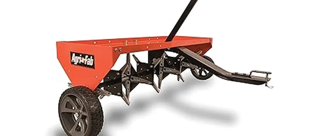 This image shows several robust commercial lawn aerators ready for landscaping work.