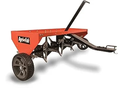 This image shows several robust commercial lawn aerators ready for landscaping work.