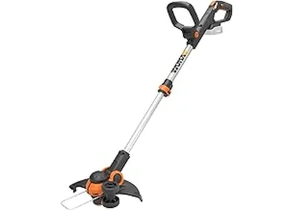This image shows a person neatly trimming a lawn edge with a powerful electric edger.