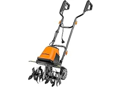 The image shows a powerful rear-tine tiller digging into soil, ideal for breaking new ground.