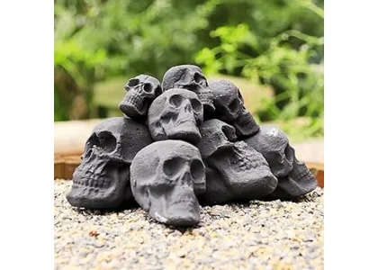 This image shows ceramic skull logs for an outdoor fireplace, perfect for a spooky ambiance.
