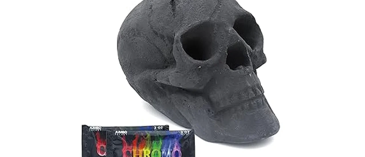 The image shows a close-up of realistic ceramic skull logs arranged in an outdoor fire pit.