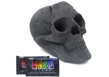 The image shows a close-up of realistic ceramic skull logs arranged in an outdoor fire pit.