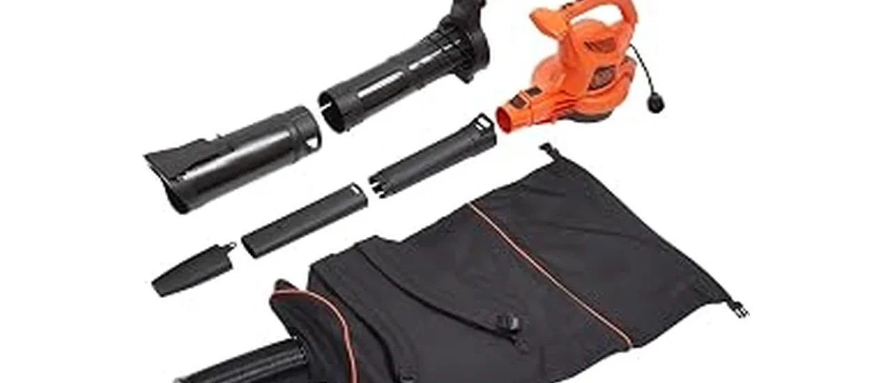 The image shows a person using a backpack leaf blower to clear leaves from a large yard.