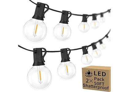 The image shows a string of commercial grade outdoor lights creating a warm ambiance for an event.