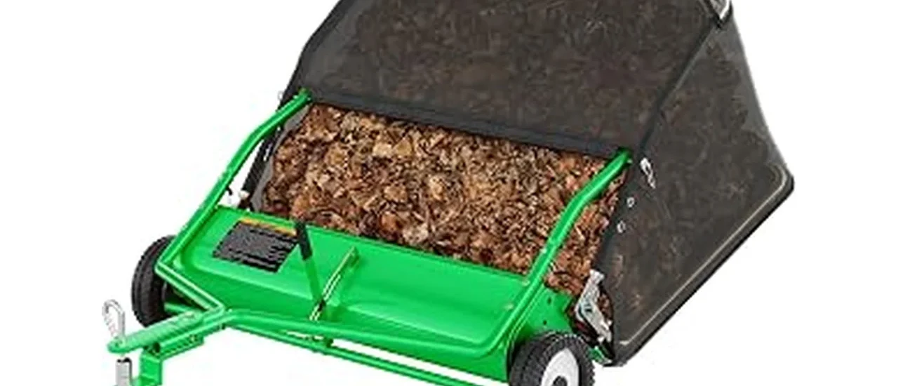 This image shows a powerful riding lawn mower attachment designed to collect leaves efficiently.