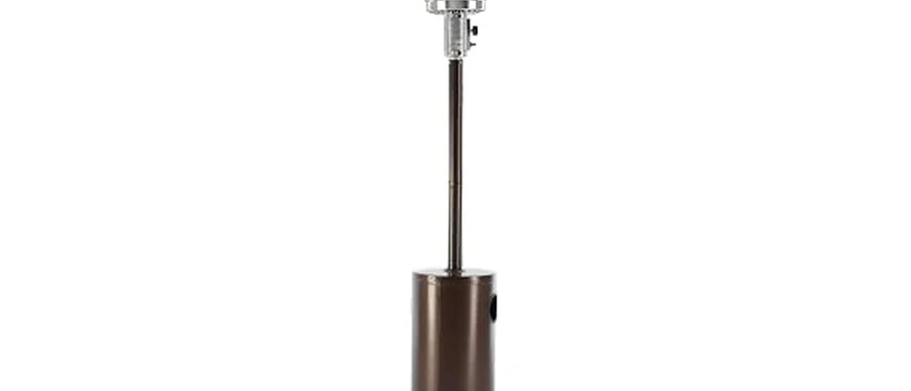 The image shows a stylish patio heater providing warmth on a cozy outdoor deck in winter.