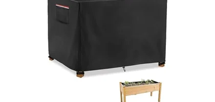 The image shows a raised garden bed covered with a protective winter cover, ideal for keeping plants safe.