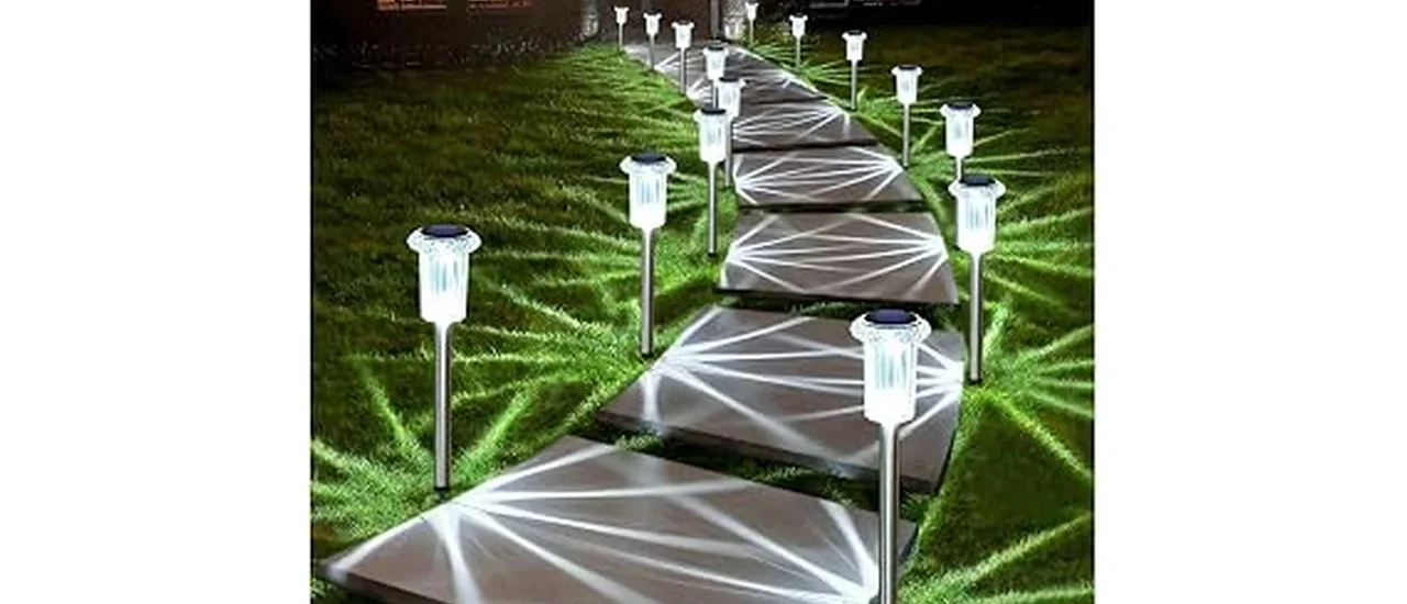 The image shows a garden path illuminated by the most popular 7 solar pathway lights, shining brightly outdoors and waterproof.