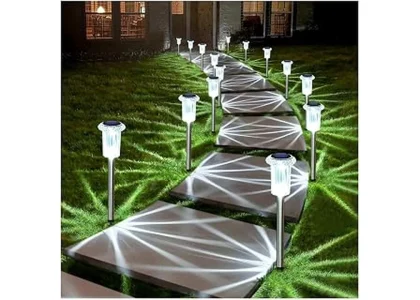 The image shows a garden path illuminated by the most popular 7 solar pathway lights, shining brightly outdoors and waterproof.