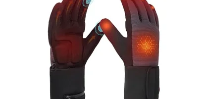 The image shows a hand wearing a featured heated work glove, ideal for cold farm tasks.