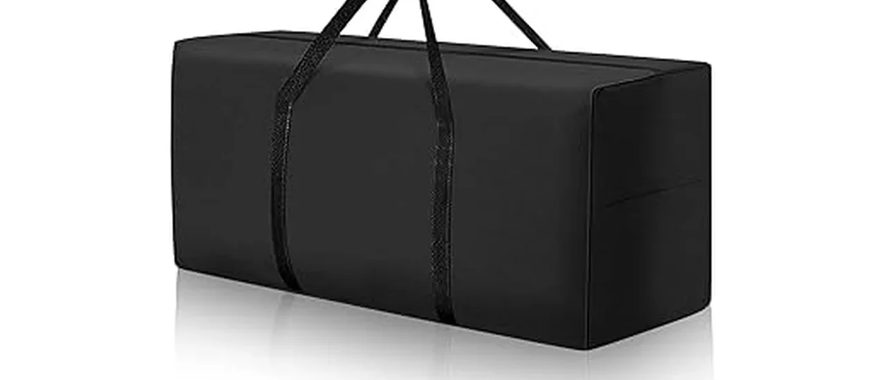 The image shows a durable, waterproof patio cushion storage bag protecting furniture cushions from the elements.